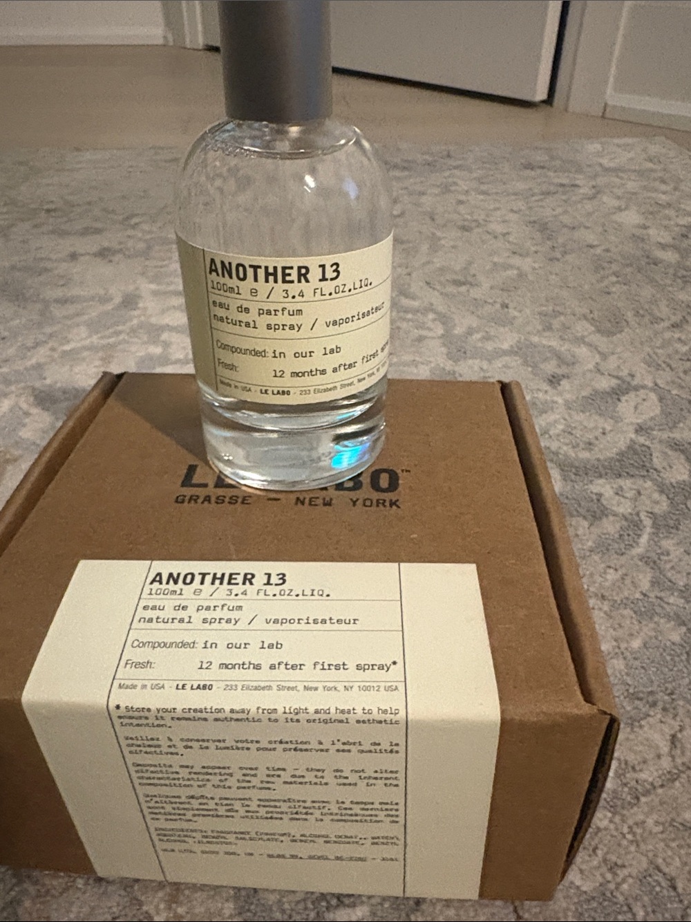 Le Labo Another 13 Clear Bottle with Beige Label and Gray Cap